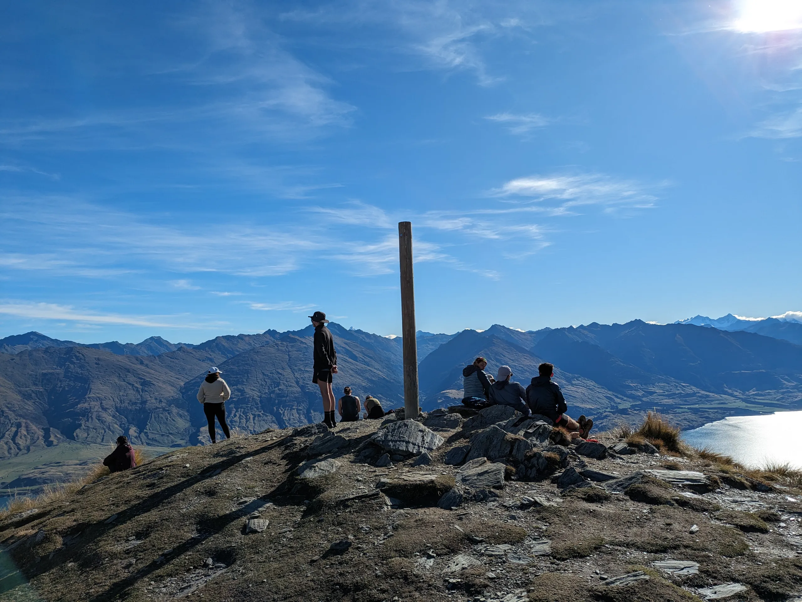 Post and crowd at the summit